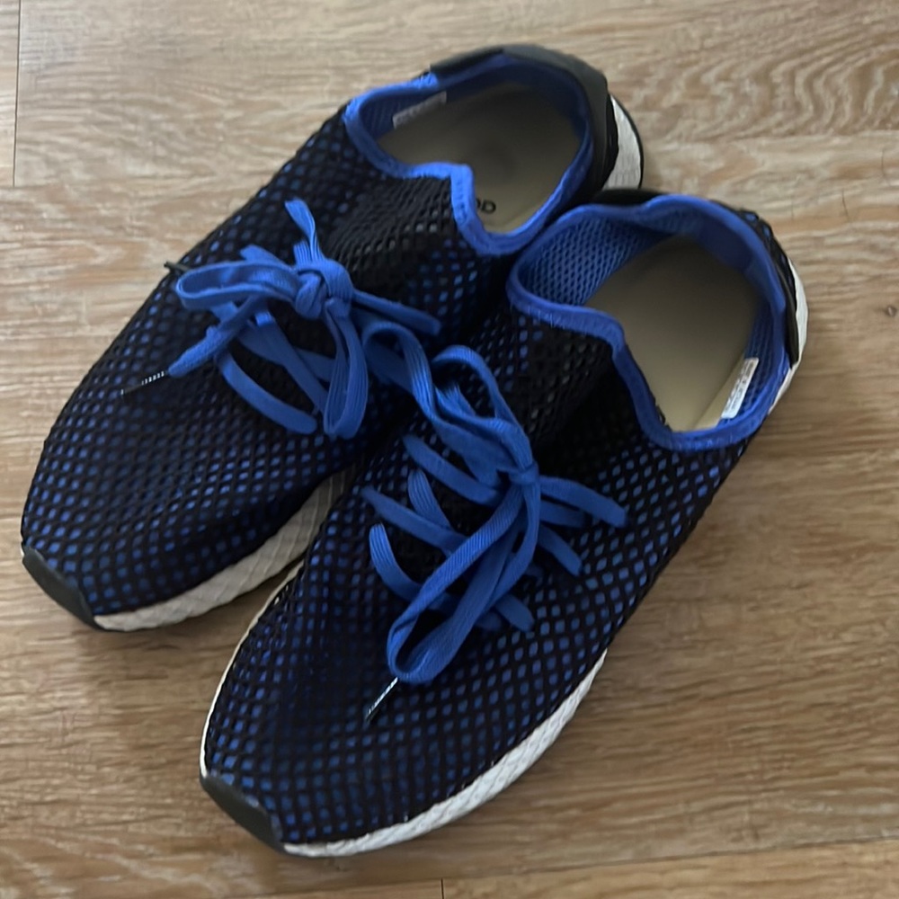 Adidas knit running shoes. Slightly worn, good condition.